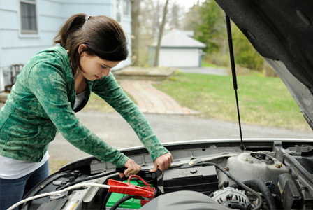 Teen girl jumping car