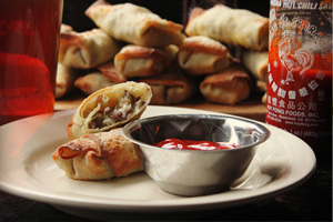Cheesesteak eggrolls with Sriracha ketchup