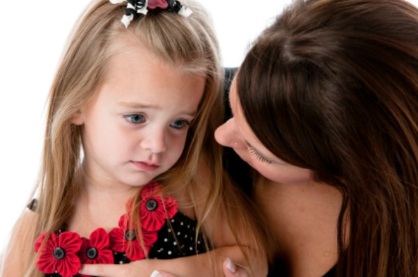 Mom scolding child