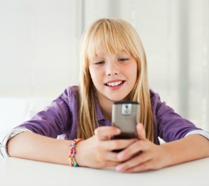 Tween girl on cell phone