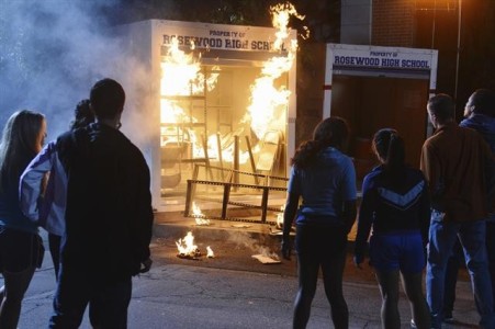 A fire traps someone in the shed