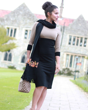 Black and camel colored maternity dress with scarf accent