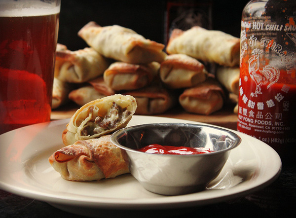 Cheesesteak eggrolls with sriracha ketchup