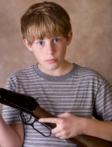 Boy with rifle