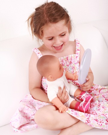 Girl with doll