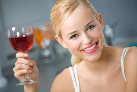 Woman drinking red wine