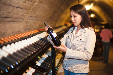 Woman with wine bottle