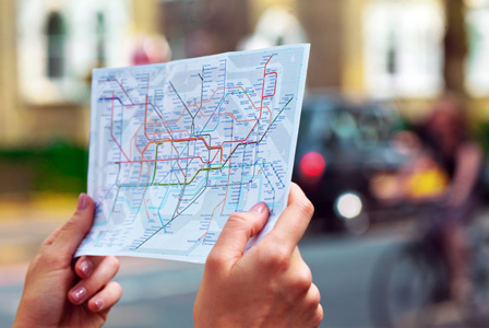 Woman on map of London underground