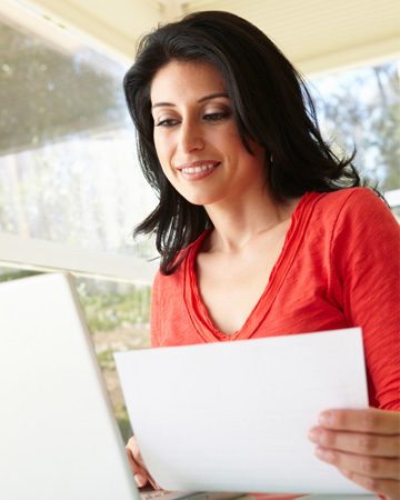 Woman working on budget at home