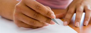 Woman writing down fears