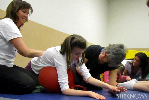 Jackie working with a teen