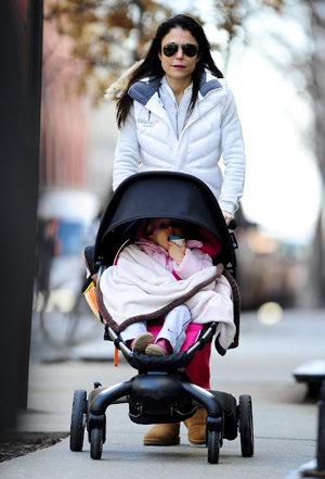 Bethenny Frankel pushing a stroller