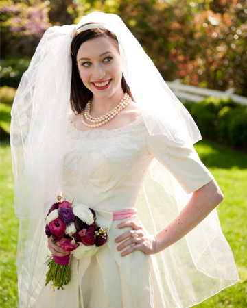 Bride wearing dress with sleeves