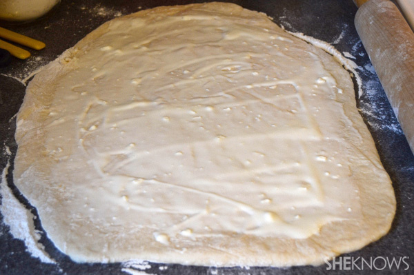 Roll dough & cover with filling