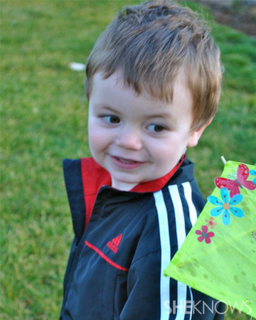 Boy with walking kite