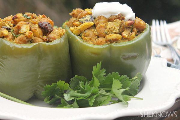 Curried chickpea stuffed peppers with slivered almonds and yogurt