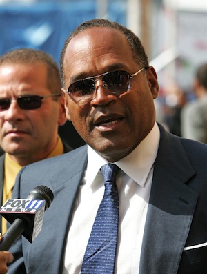 OJ Simpson talks to reporters in 2005
