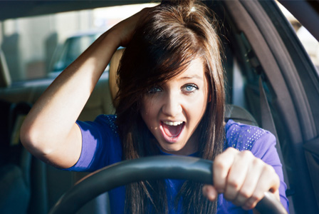 Stressed woman in car