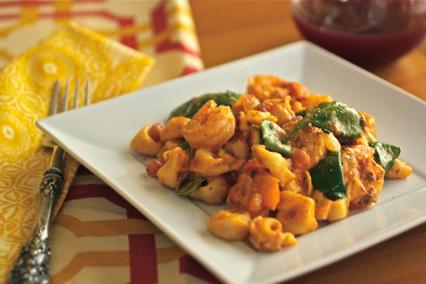 Tortellini, shrimp and spinach in creamy tomato sauce