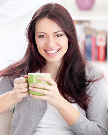 Woman drinking grean tea