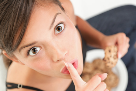 woman-eating-cookies-horiz.jpg