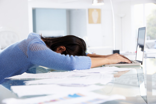 Woman stressed with finances