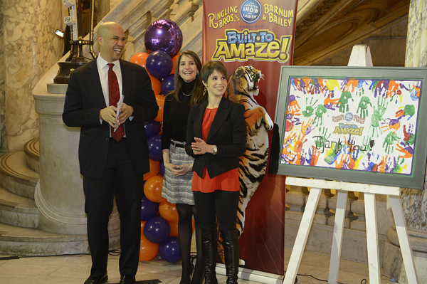 Nicole Feld and sister Alana with Cory Booker