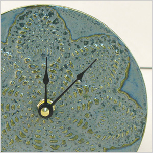 ceramic doily-imprinted clock