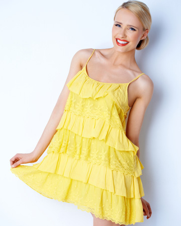 Happy woman in yellow dress