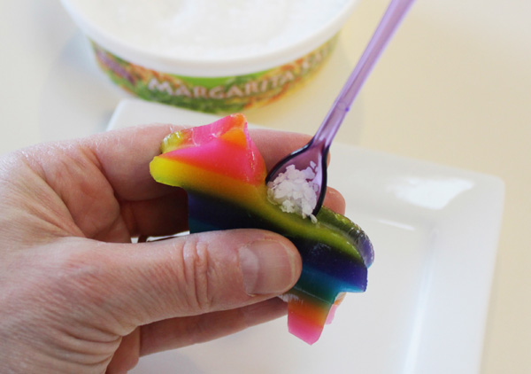 Adding salt into the pinata-shaped jello shot