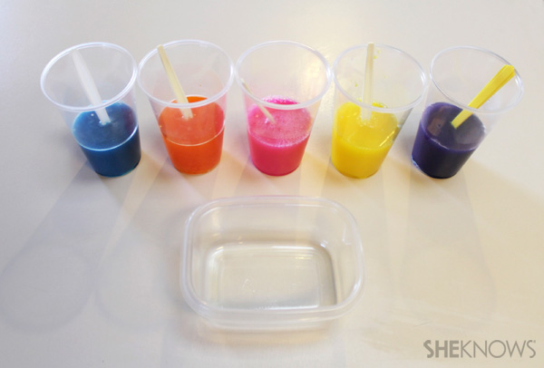 Add food coloring to the cups of gelatin-margarita mixture