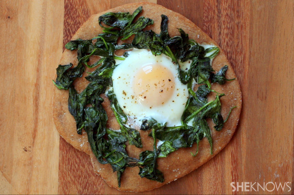Egg and greens pizza
