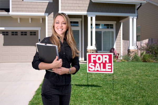 Realtor showing a house