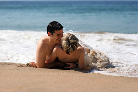 Couple having sex on the beach