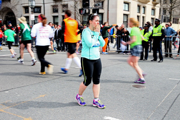 Runners reacting to the Boston Marathon bombing