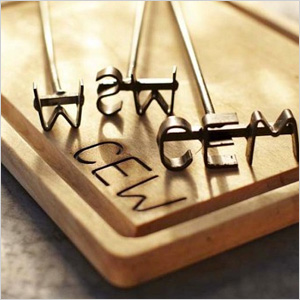 Monogramed steak brand and carving set