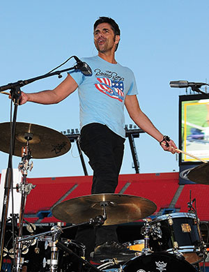 John Stamos on the drums