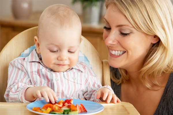 Mother feeding her baby