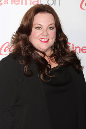 Melissa McCarthy fires an extra