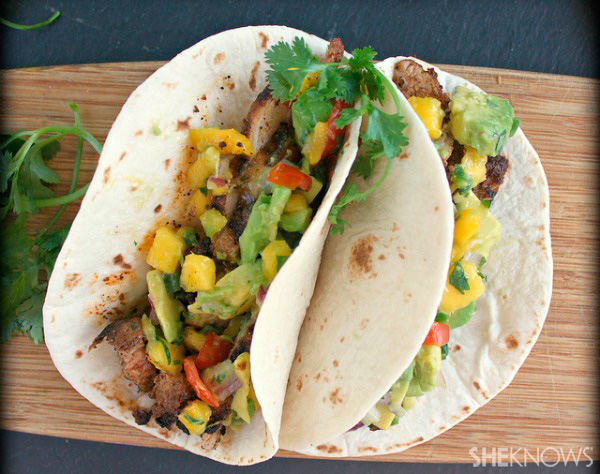 Grilled pork soft tacos with spicy avocado mango salsa