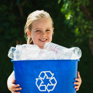 Girl recycling