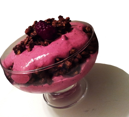 Breakfast parfait with cocoa crunch and blackberry cream