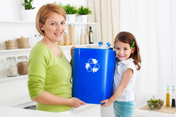 mother and daughter recycling