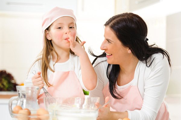 Mother and daughter baking