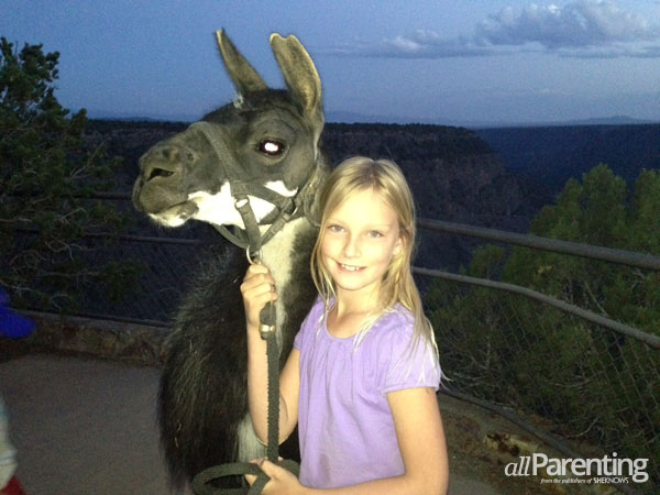 Olivia with her llama companion, Diego, from Wild Earth Llama Adventures.
