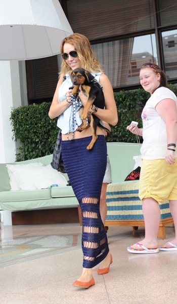 Miley Cyrus with dog