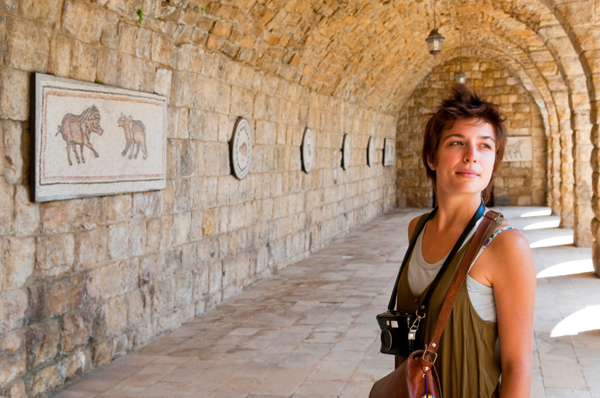 Young female tourist with camera at Beiteddine Palace in Lebanon