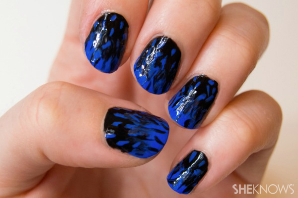 Fashion-inspired nail design: Black and textured blue nails