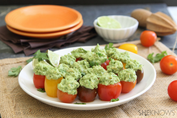 Bite-sized guacamole stuffed tomatoes