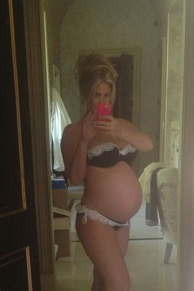 Pregnant Kim Zolciak bikini baby bump - twins